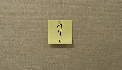 sticky note with exclamation point