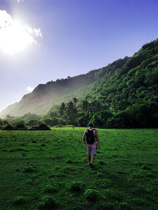 man walking in bright open space