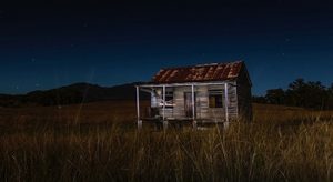night shot of a shack