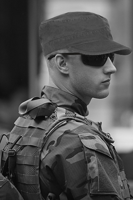 soldier in hat and sunglasses