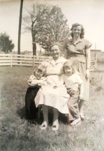 the author as a little girl with her sister, mother, and grandmother