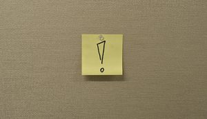 sticky note with exclamation point