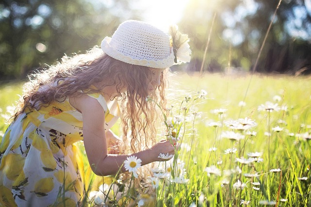 young girl dancing in the sunshine