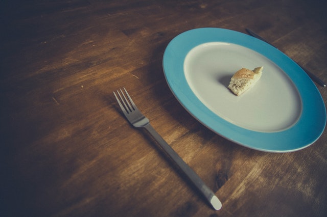 plate with small scrap of bread